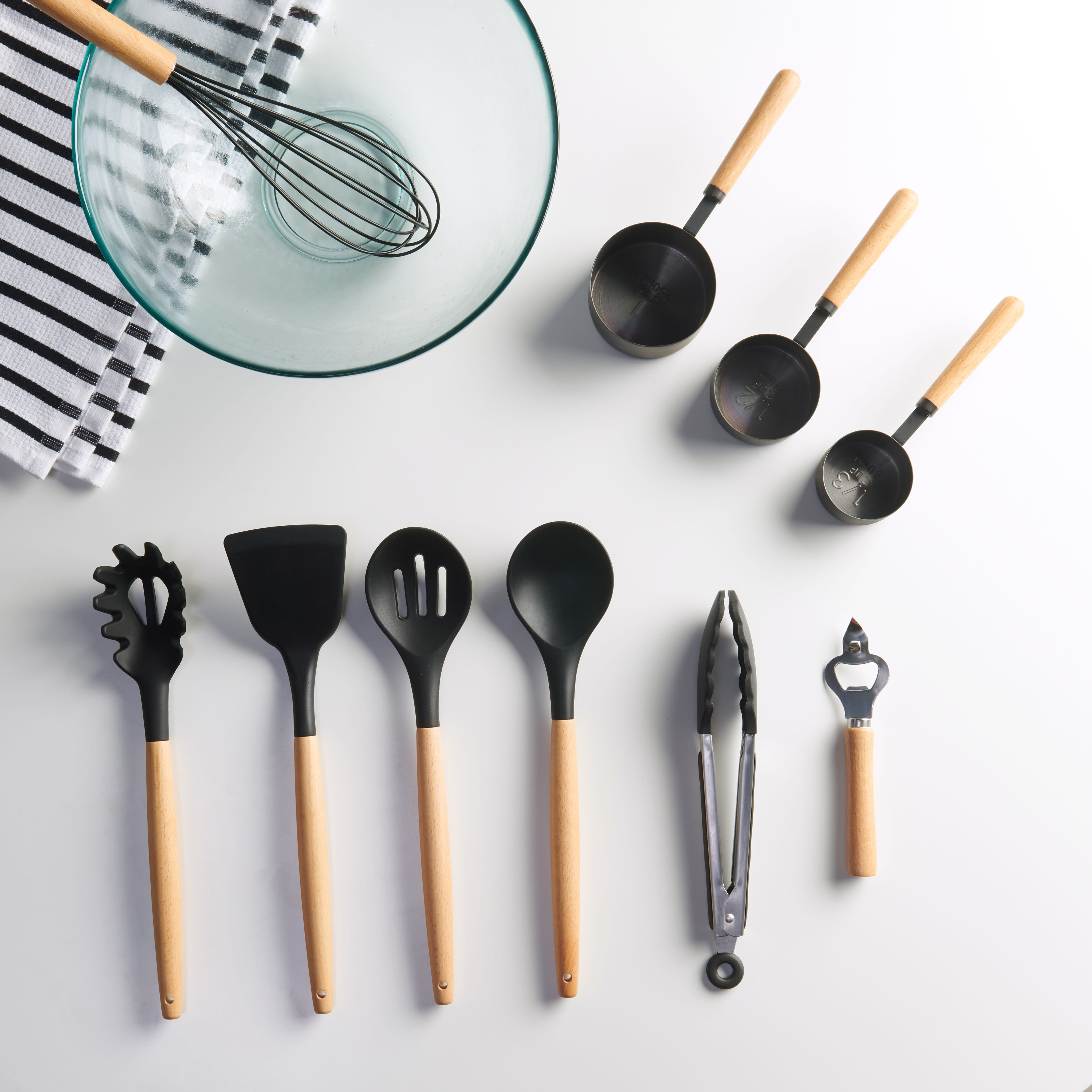 https://cdn.apartmenttherapy.info/image/upload/v1570727421/k/MoDRN_Scandinavian_10_Piece_Silicone_and_Wood_Kitchen_Utensils.jpg