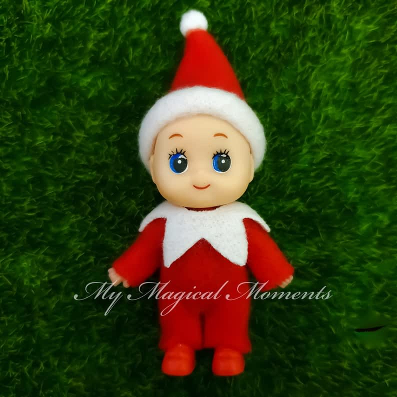 Hand Knitted baby Christmas Elf/ Naughty Elf 