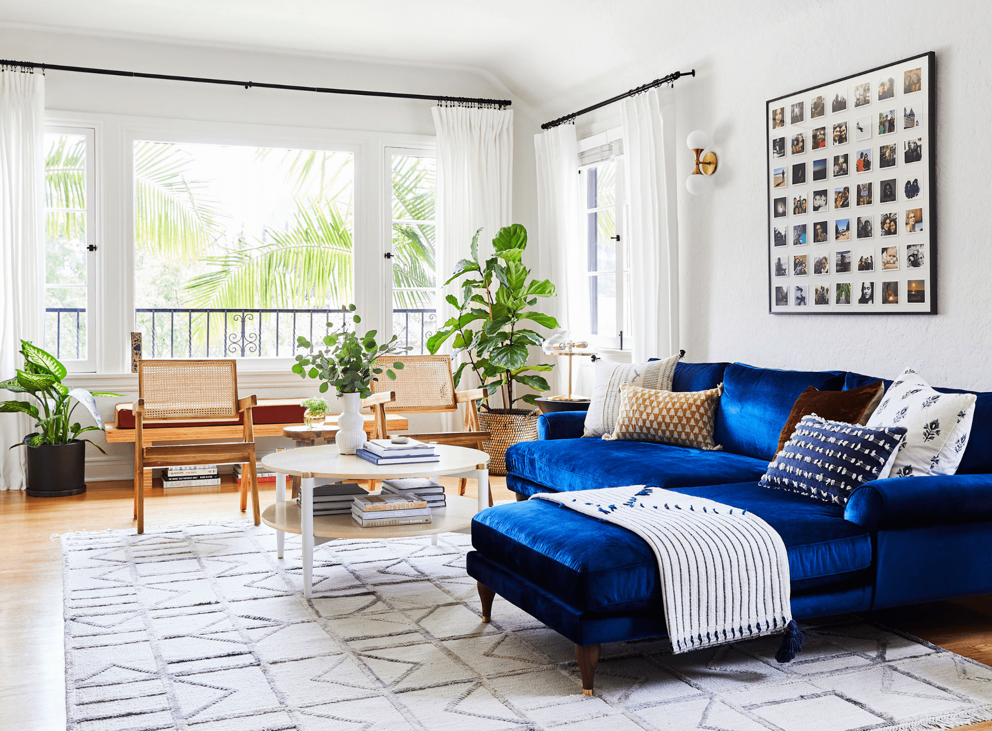 Low Back White Sofa with Blue Pillows and Throw - Transitional - Living Room