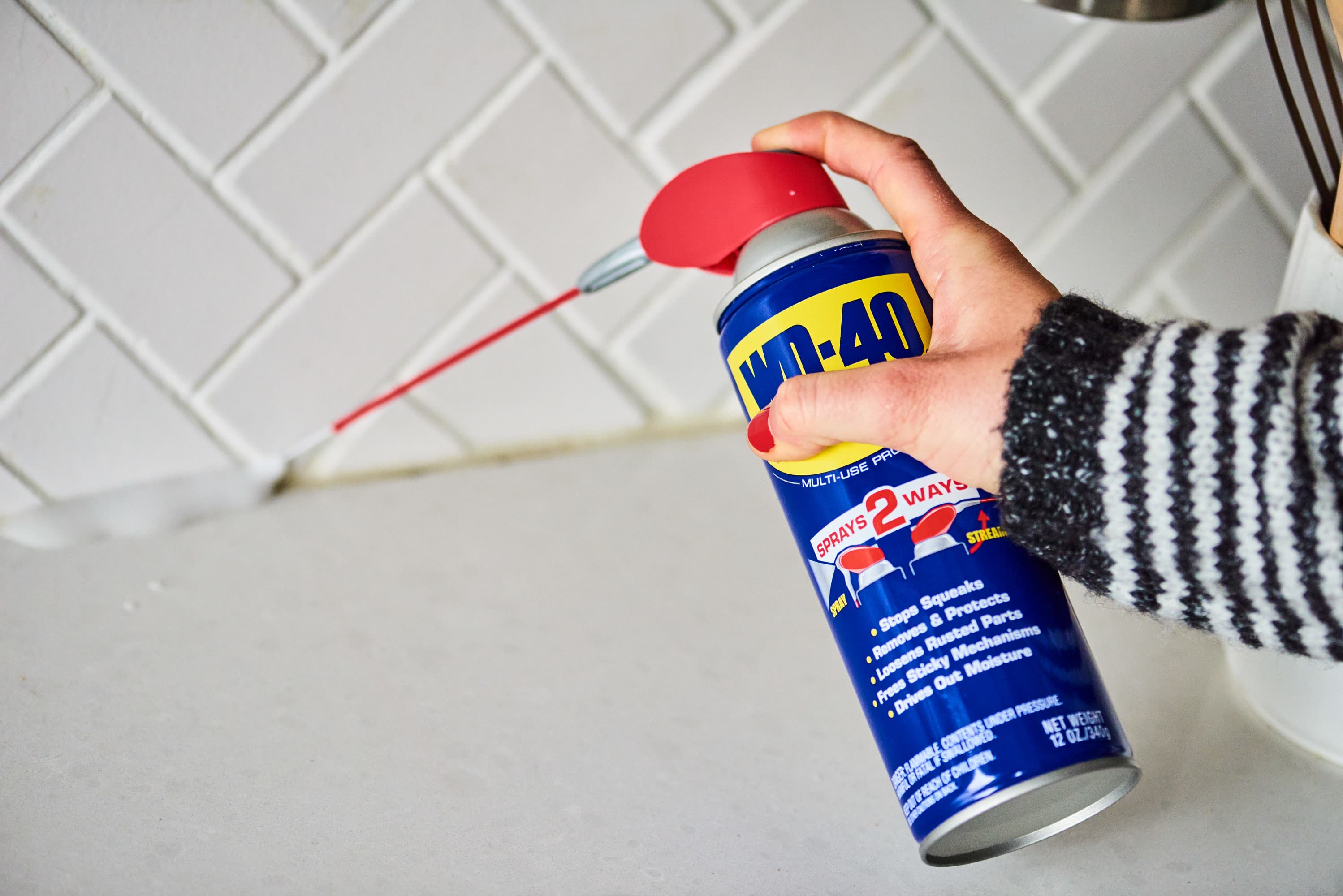 Is it okay to spray regular wd-40 to clean the dirt, mainly the