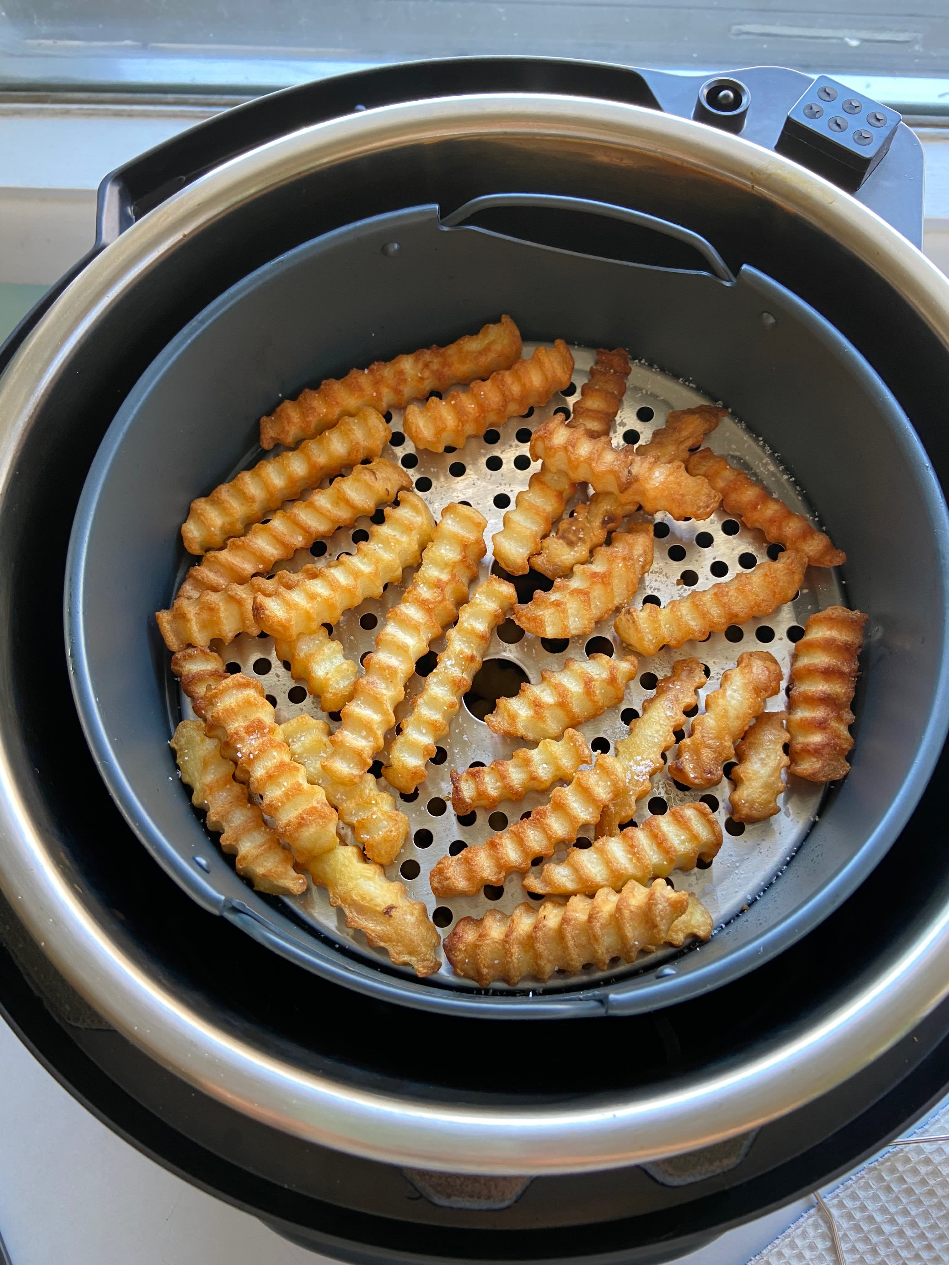 The Instant Pot Air Fryer Lid works as promised, but only for small batches
