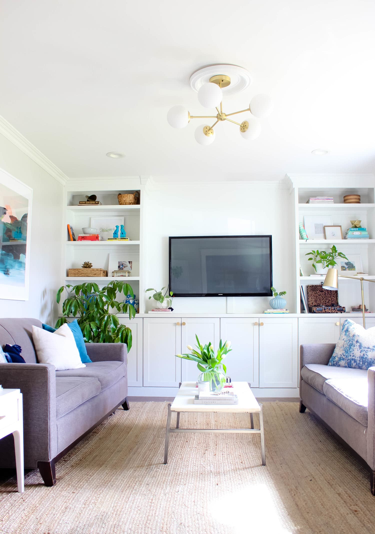 25 Best Tv Wall Ideas How To Arrange A Wall With A Tv Apartment Therapy