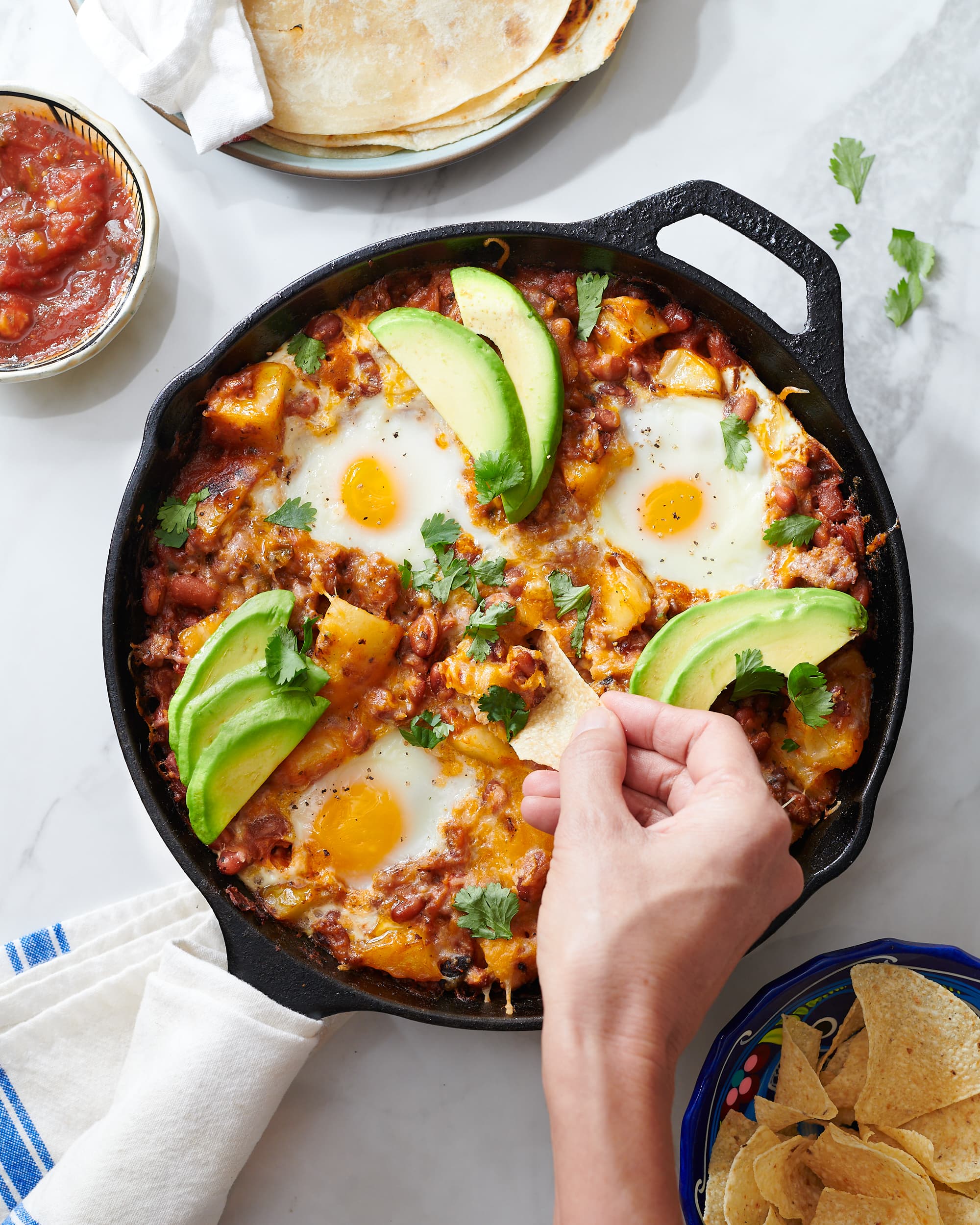 https://cdn.apartmenttherapy.info/image/upload/v1608304778/k/Photo/Recipes/2020-12-most-wanted-the-best-loaded-breakfast-skillet/k-photo-2020-12-breakfast-skillet-3.jpg