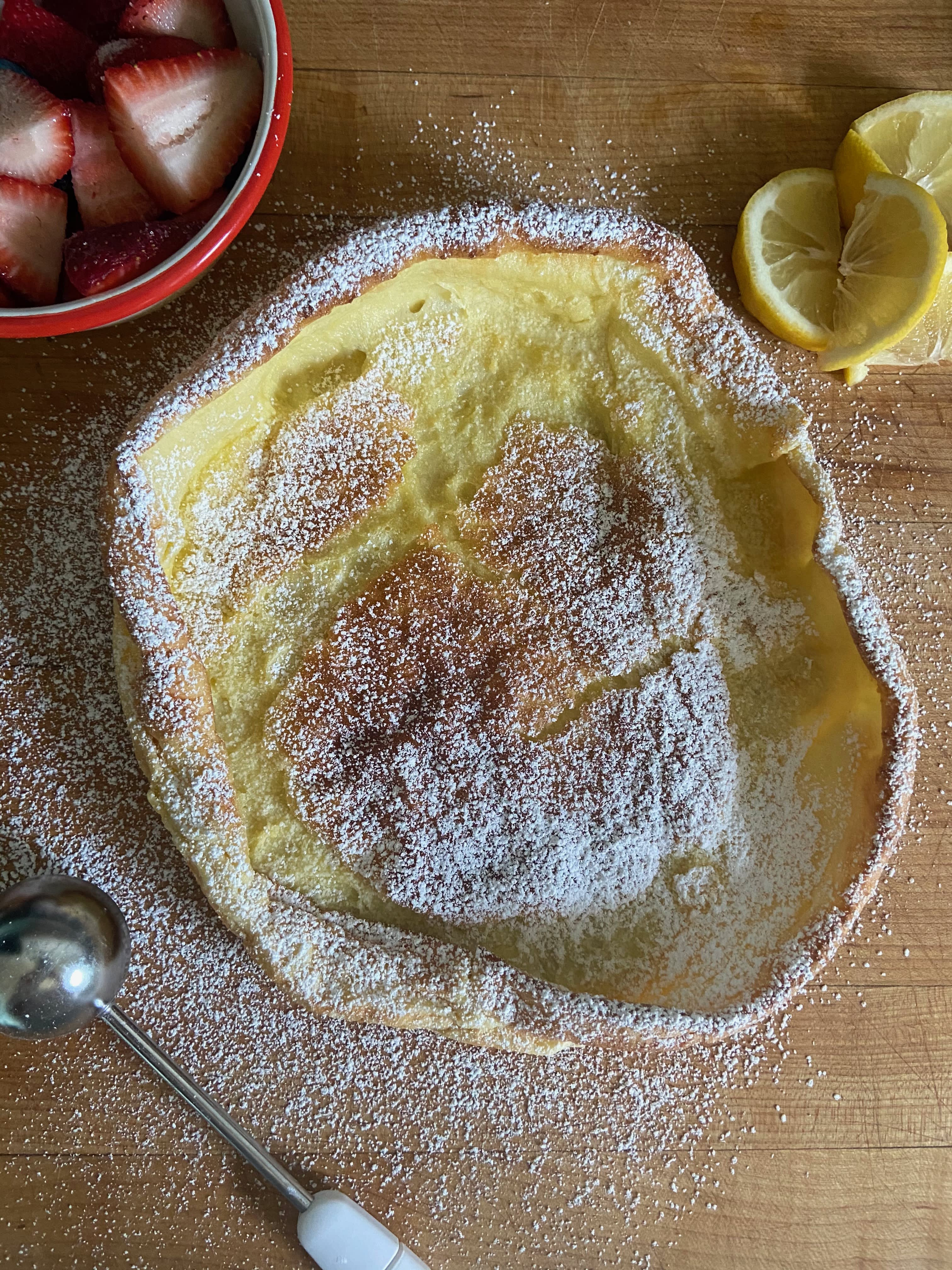 Dutch Baby Pancake with Lemon and Powdered Sugar - AngelaLynne