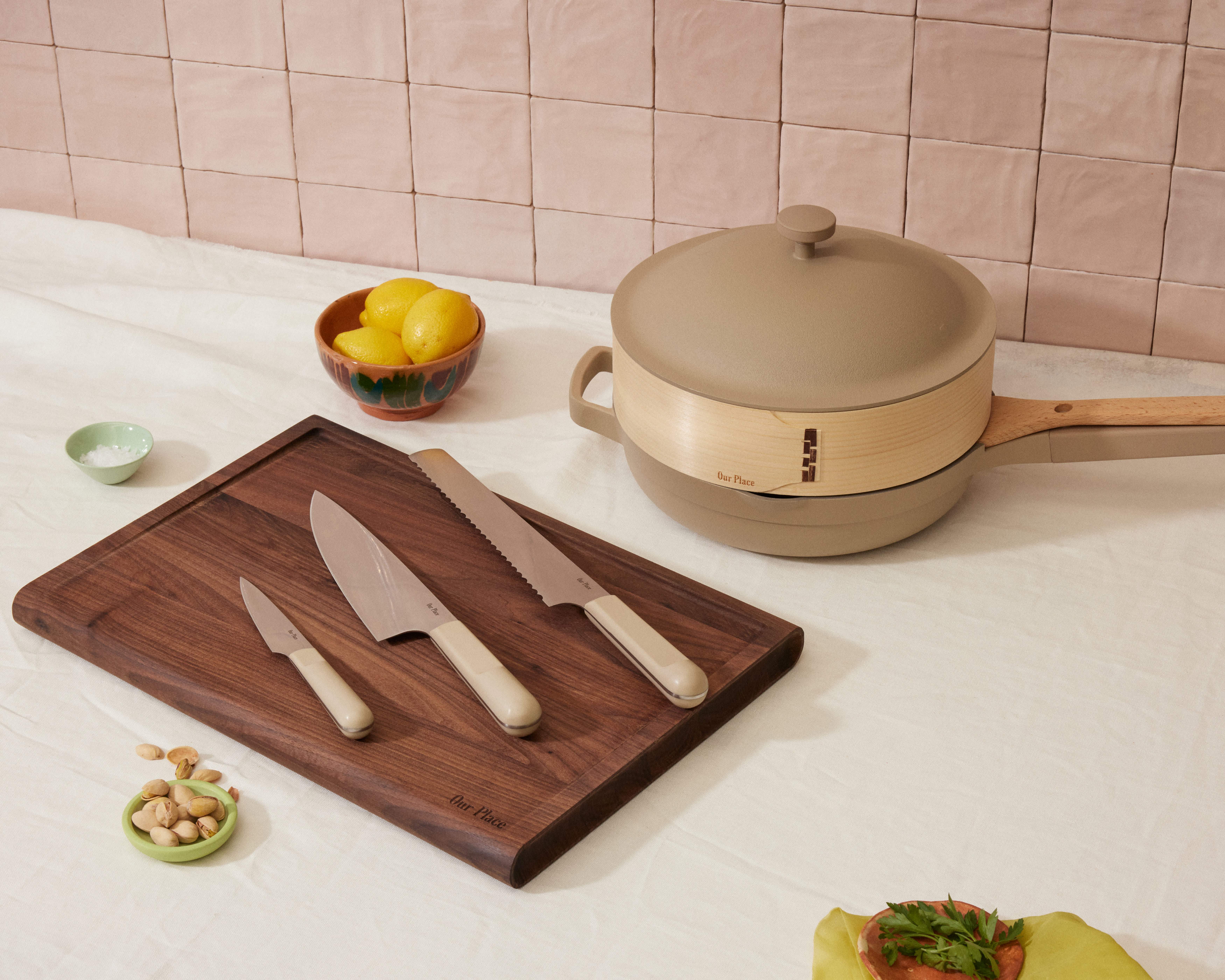 Caraway cookware launches knife sets, utensils, and cutting boards