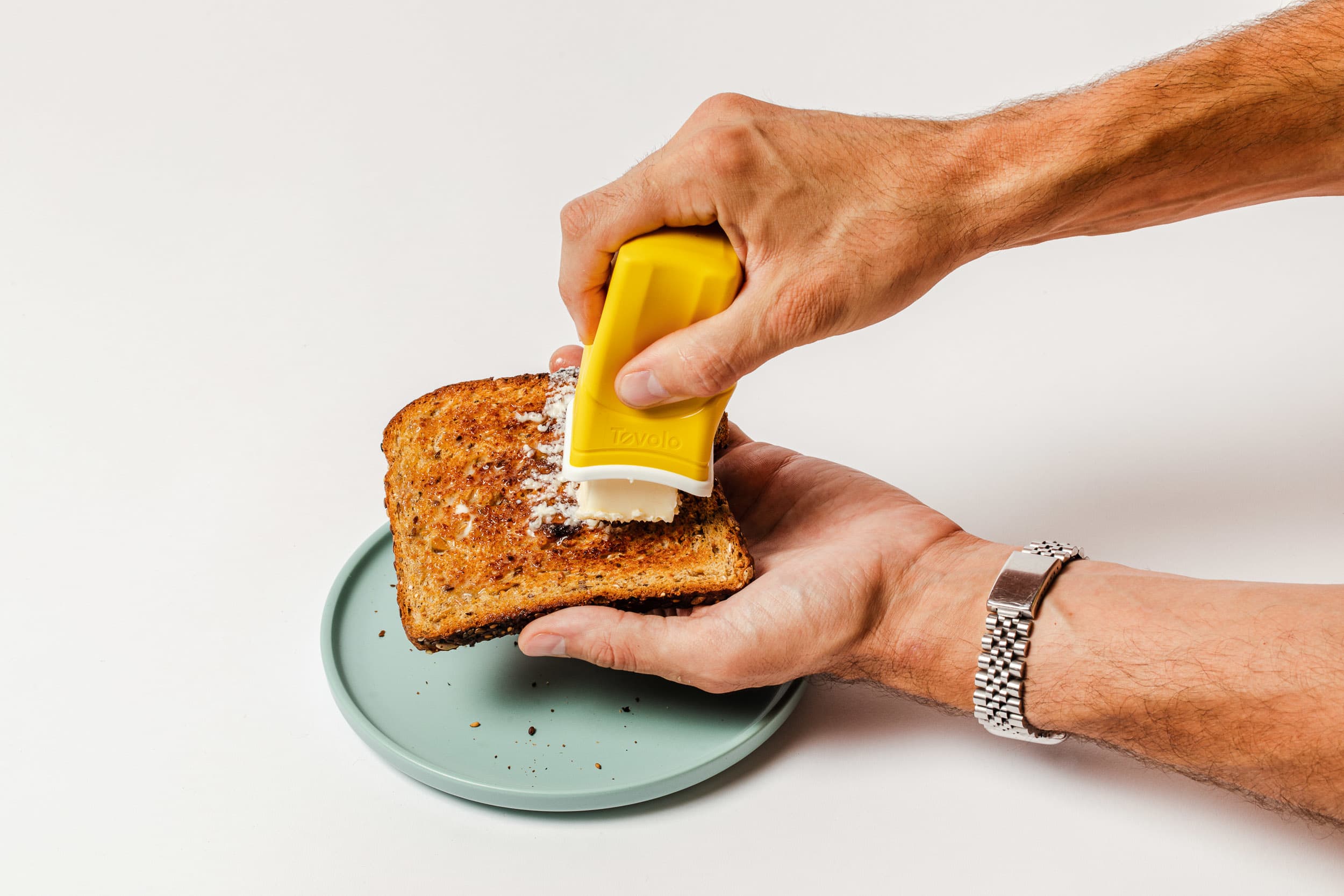 Use a bread knife to scrape cold butter and spread it easily