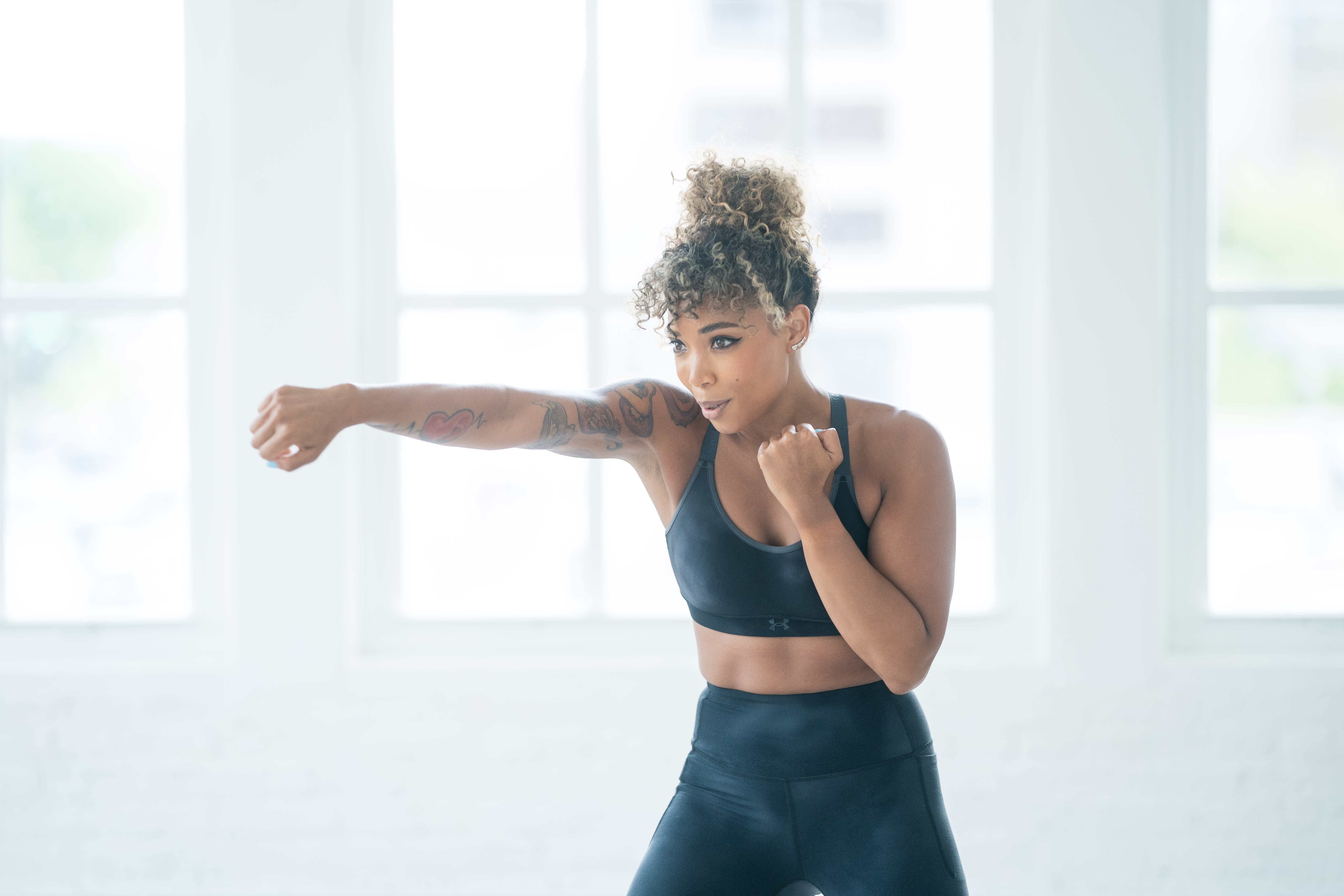 10 Minute Bodyweight Boxing Workout, by Sweat Trainer Monica Jones Apartment Therapy