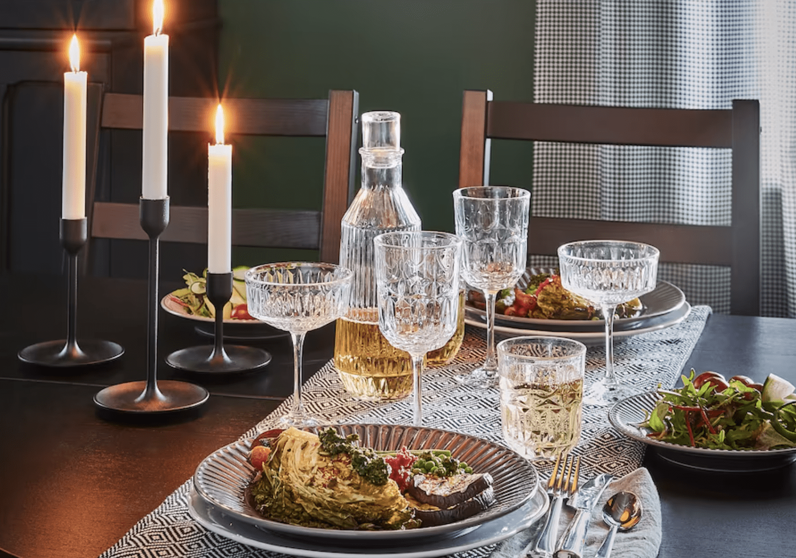 https://cdn.apartmenttherapy.info/image/upload/v1650474786/at/style/2022-04/Fancy%20Glasses%20Under%20%2420/IKEA%20Glassware%20Tablescape.png