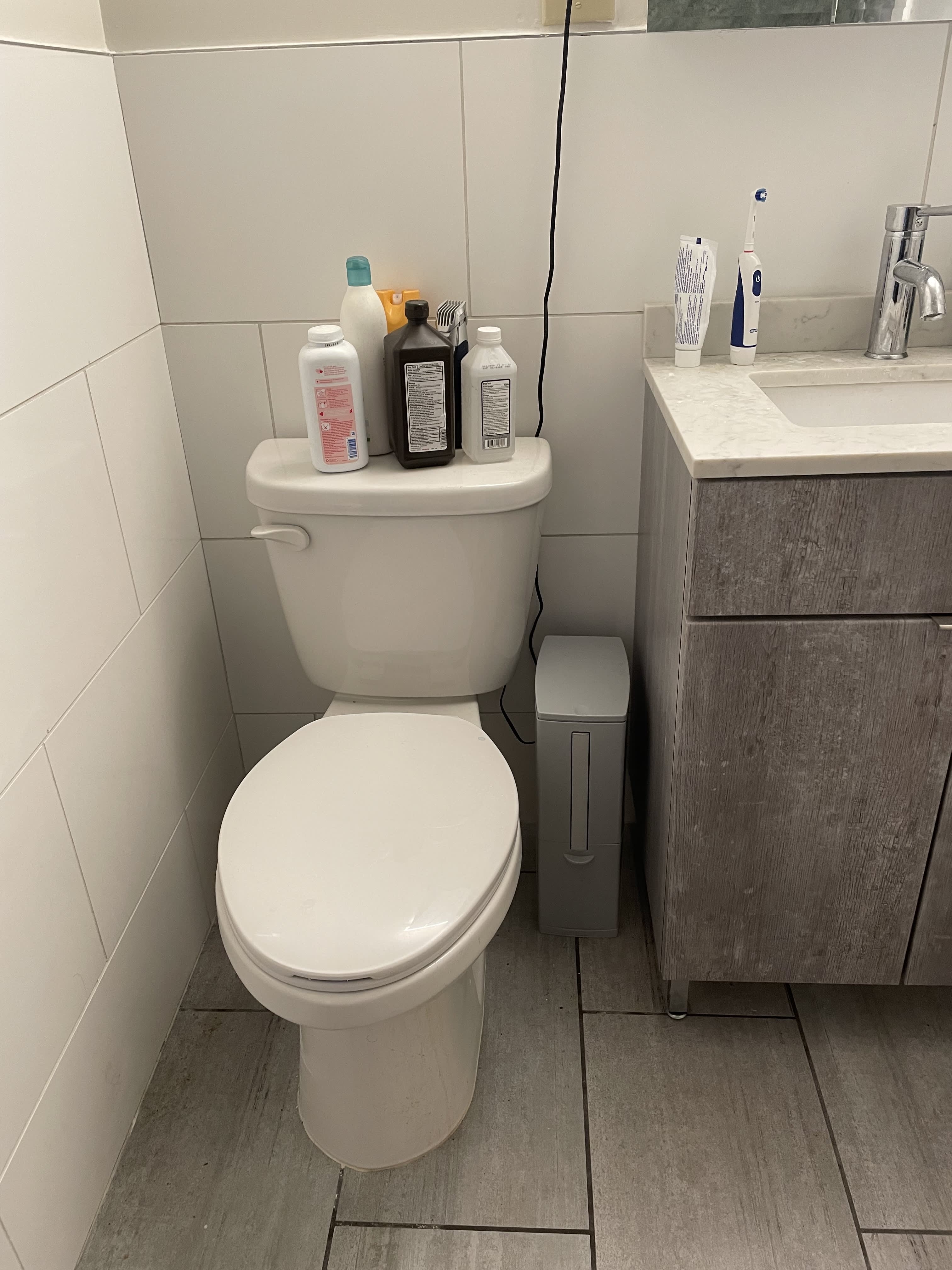 https://cdn.apartmenttherapy.info/image/upload/v1659982874/at/cq-acrylic-amazon-bathroom-trash-can.jpg