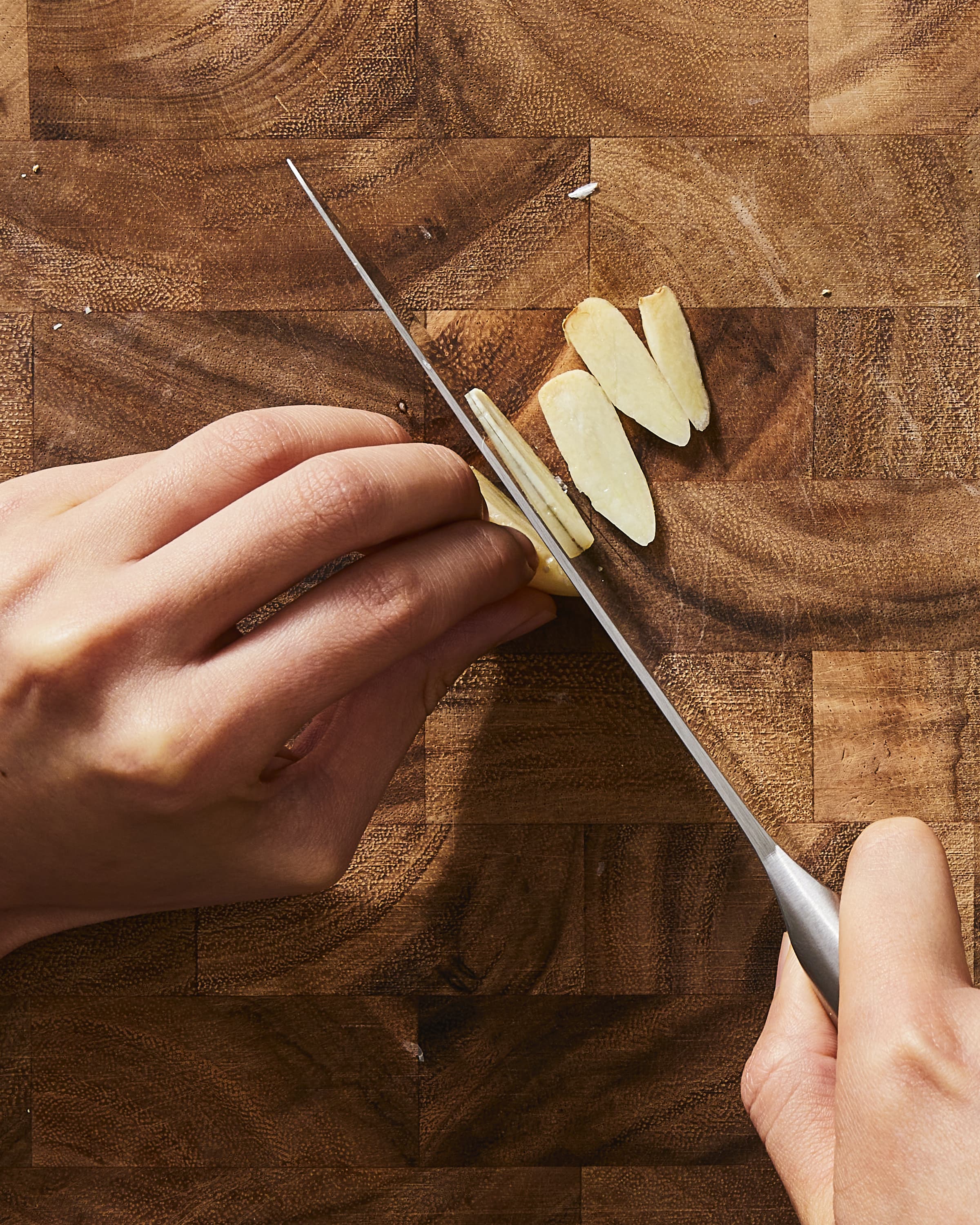 The Best Way to Mince Garlic  We've all been there—attempting to wrangle  small and slippery garlic cloves as they stick to our knives and roll off  our cutting boards, only to