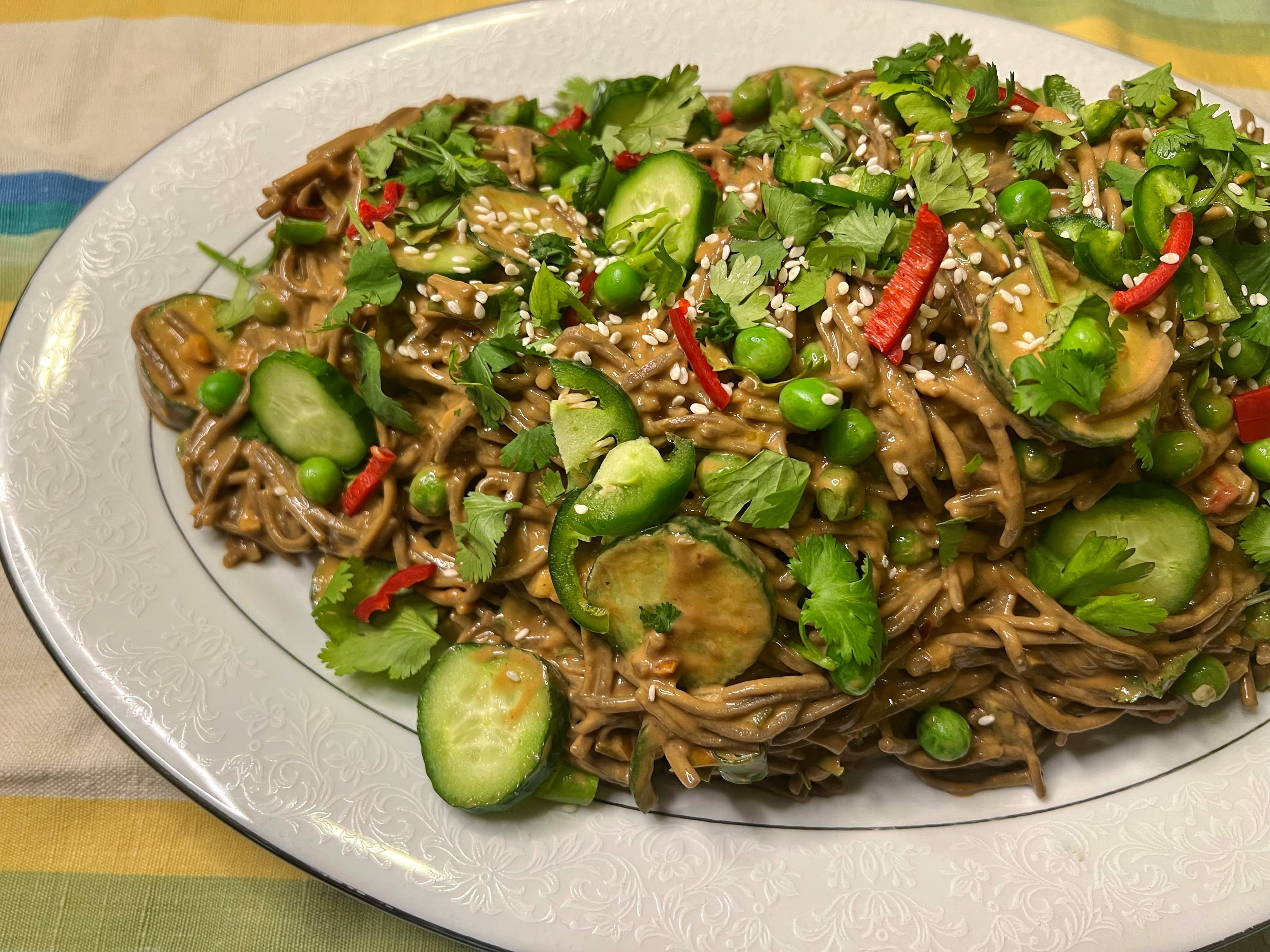 https://cdn.apartmenttherapy.info/image/upload/v1666622638/k/Edit/2022-10-Frozen-Peas-Review/Peanut_Noodles_with_Peas_Cilantro_Cucumber_and_Chilis.jpg