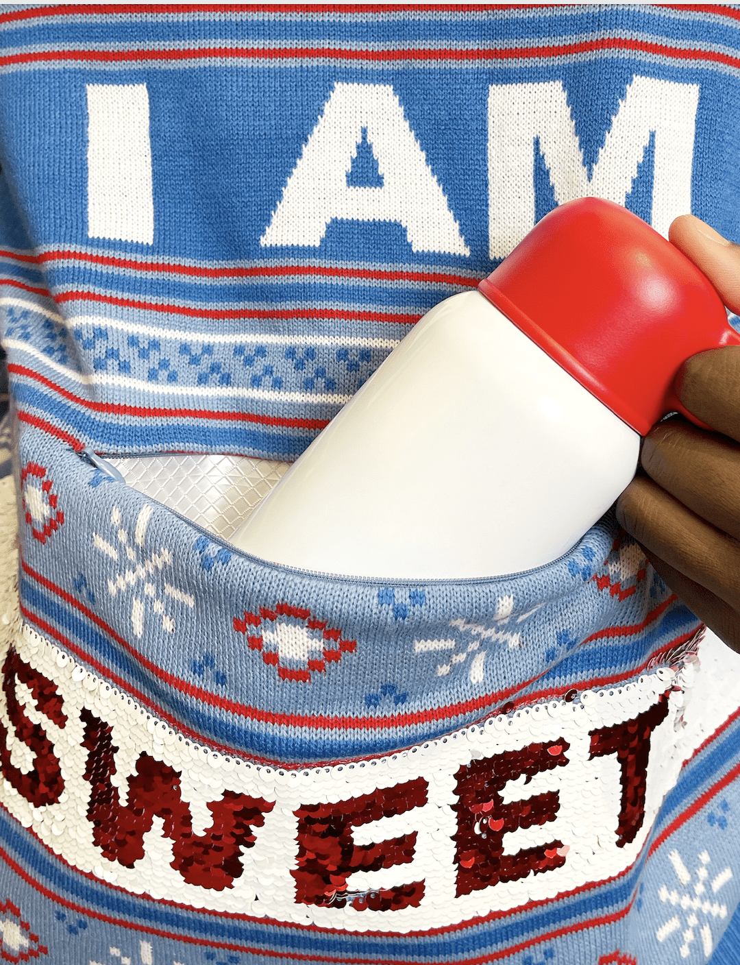 Swiss Miss is Dropping a Cocoa-Scented Holiday Sweater — Here's