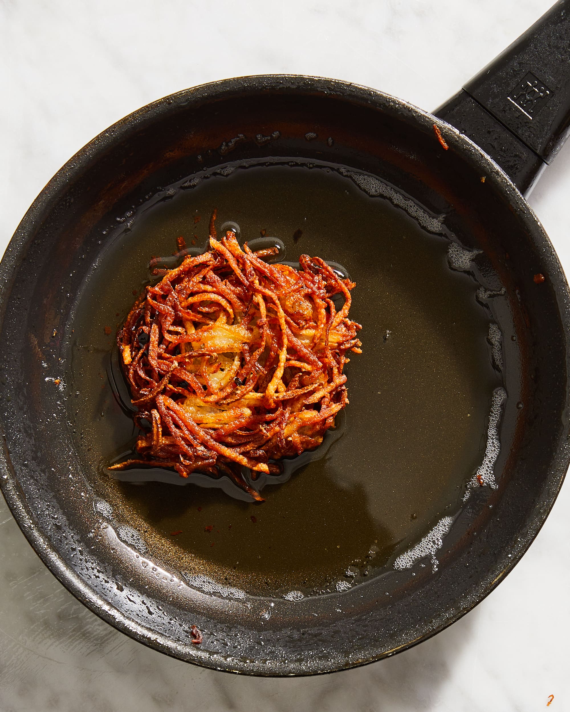 This Simple Device Makes Cooking Latkes a Mess-Free Affair - CNET