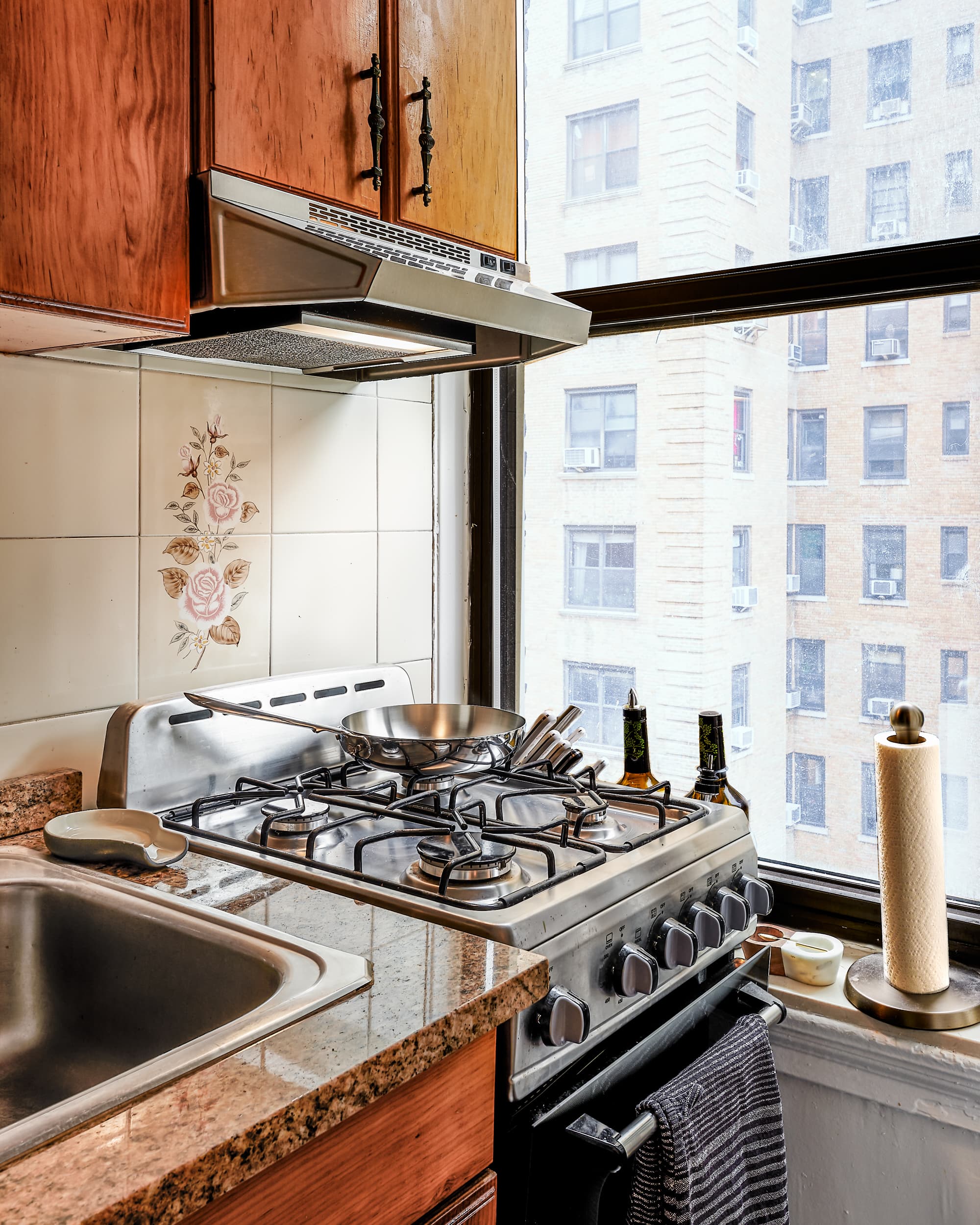 Here's How to Squeeze a Little More Storage Space into a Tiny Kitchen  Without It