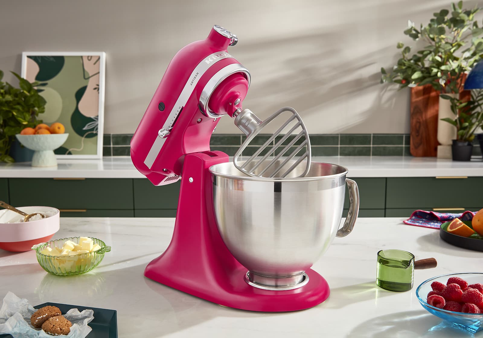 https://cdn.apartmenttherapy.info/image/upload/v1675793210/commerce/KitchenAid_2023_COTY_Hibiscus_stand_mixer_1.jpg