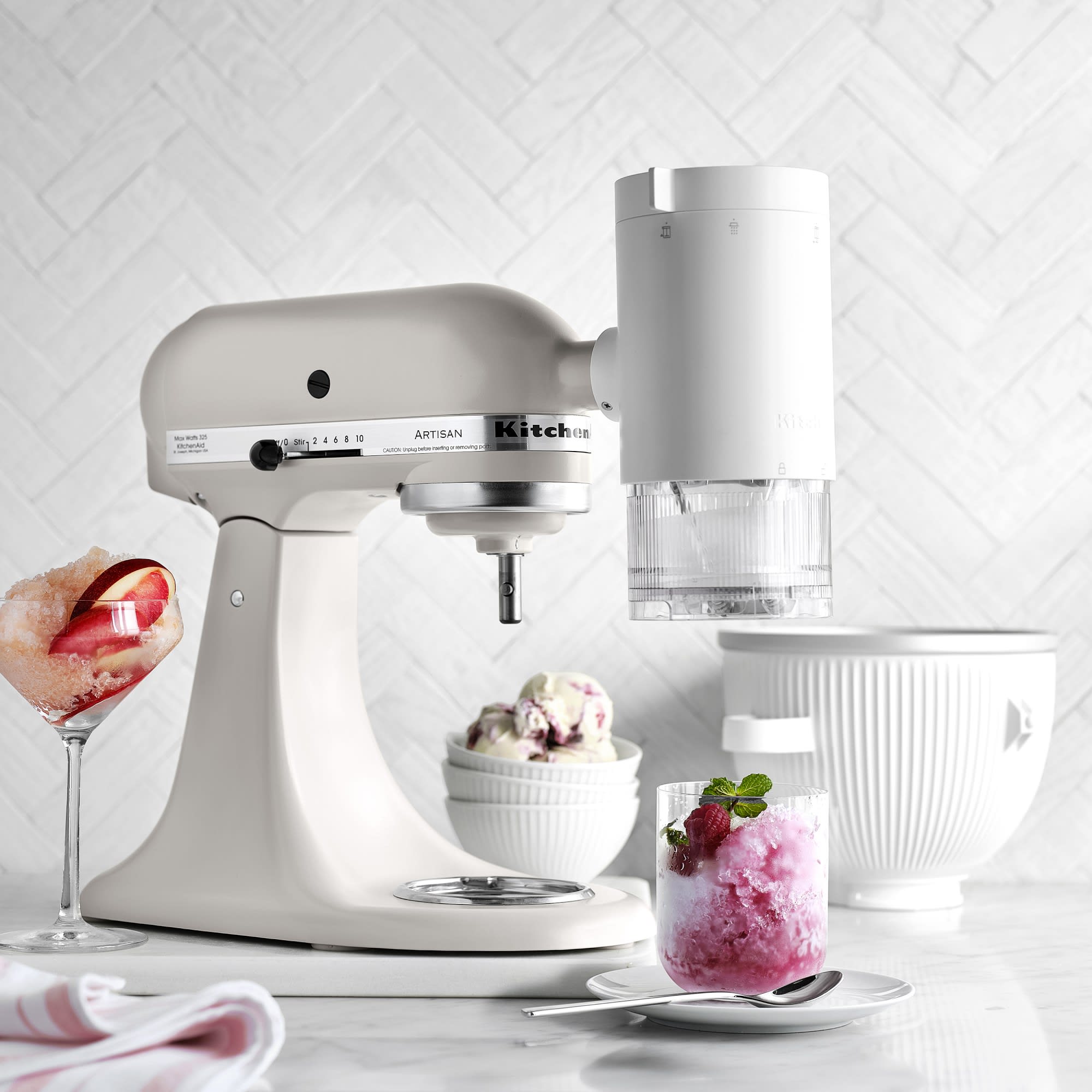 Use the KitchenAid® Shave Ice Attachment to shave fluffy treats