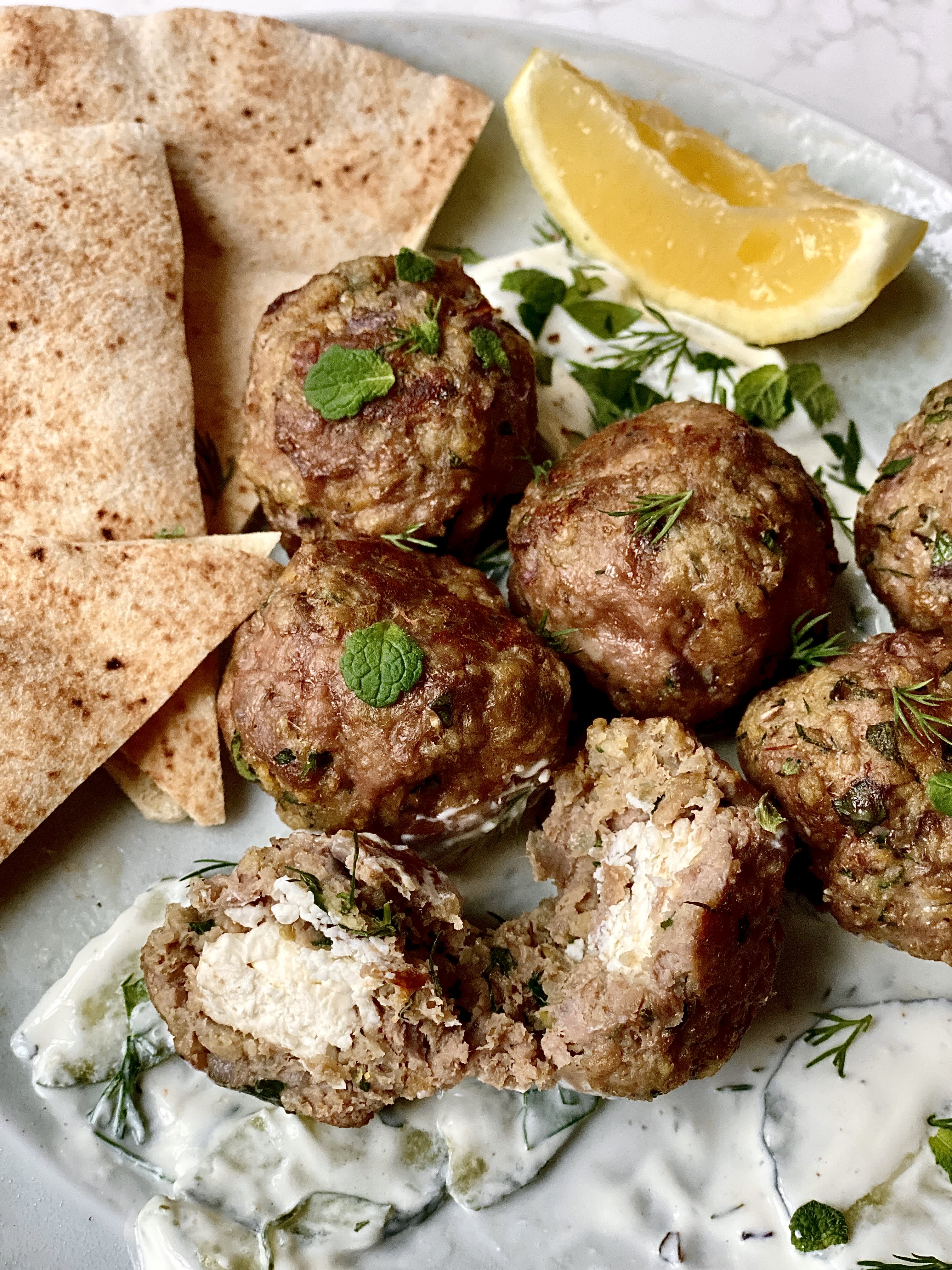 https://cdn.apartmenttherapy.info/image/upload/v1678811964/k/Edit/2023-03-feta-stuffed-lamb-meatballs/feta-stuffed-lamb-meatballs-7128.jpg