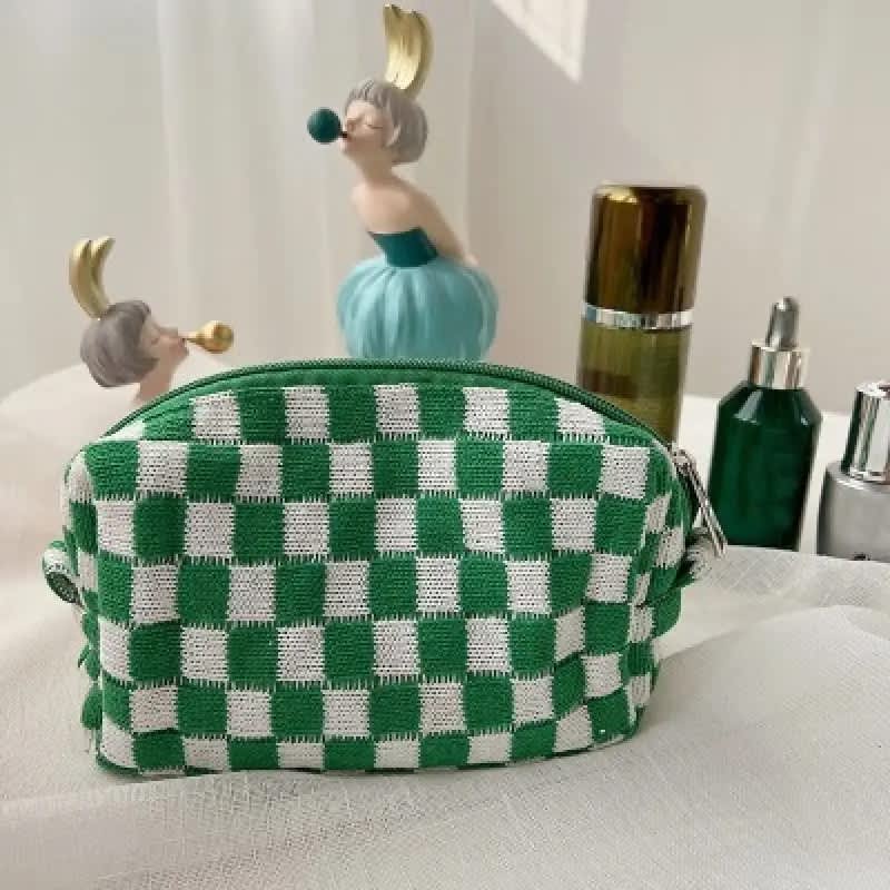 https://cdn.apartmenttherapy.info/image/upload/v1680029666/at/style/2023-04/home-decor-items-ive-purchased-on-temu/temu-checkered-pattern-zipper-makeup-bag.jpg
