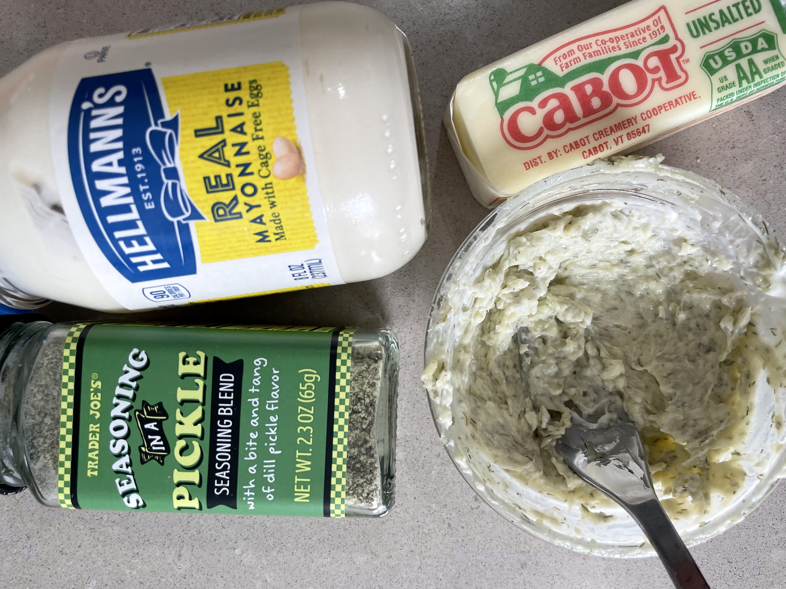 https://cdn.apartmenttherapy.info/image/upload/v1681233222/k/Edit/2023-04-trader-joes-secret-better-grilled-cheese/mayo-pickle-seasoning-butter.jpg