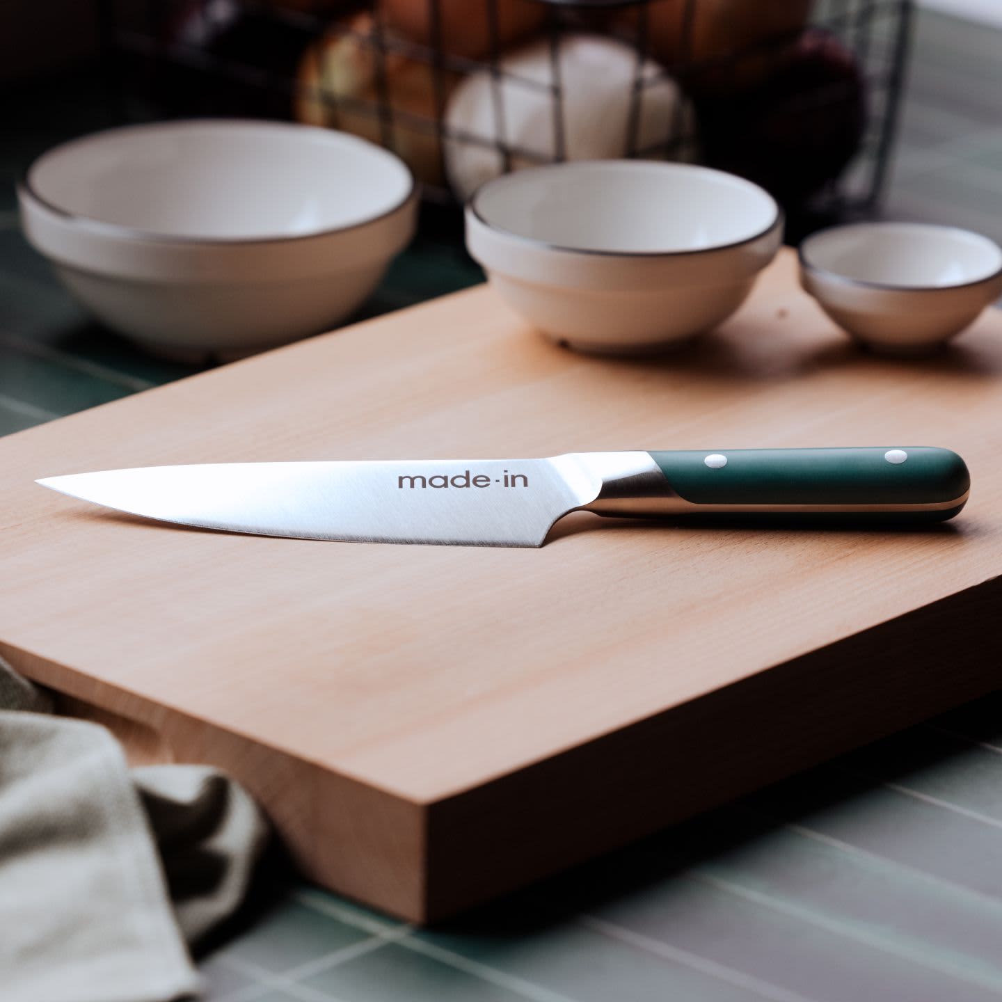 https://cdn.apartmenttherapy.info/image/upload/v1681933554/commerce/6-inch-chef-knife-hudson-green-made-in-2.jpg