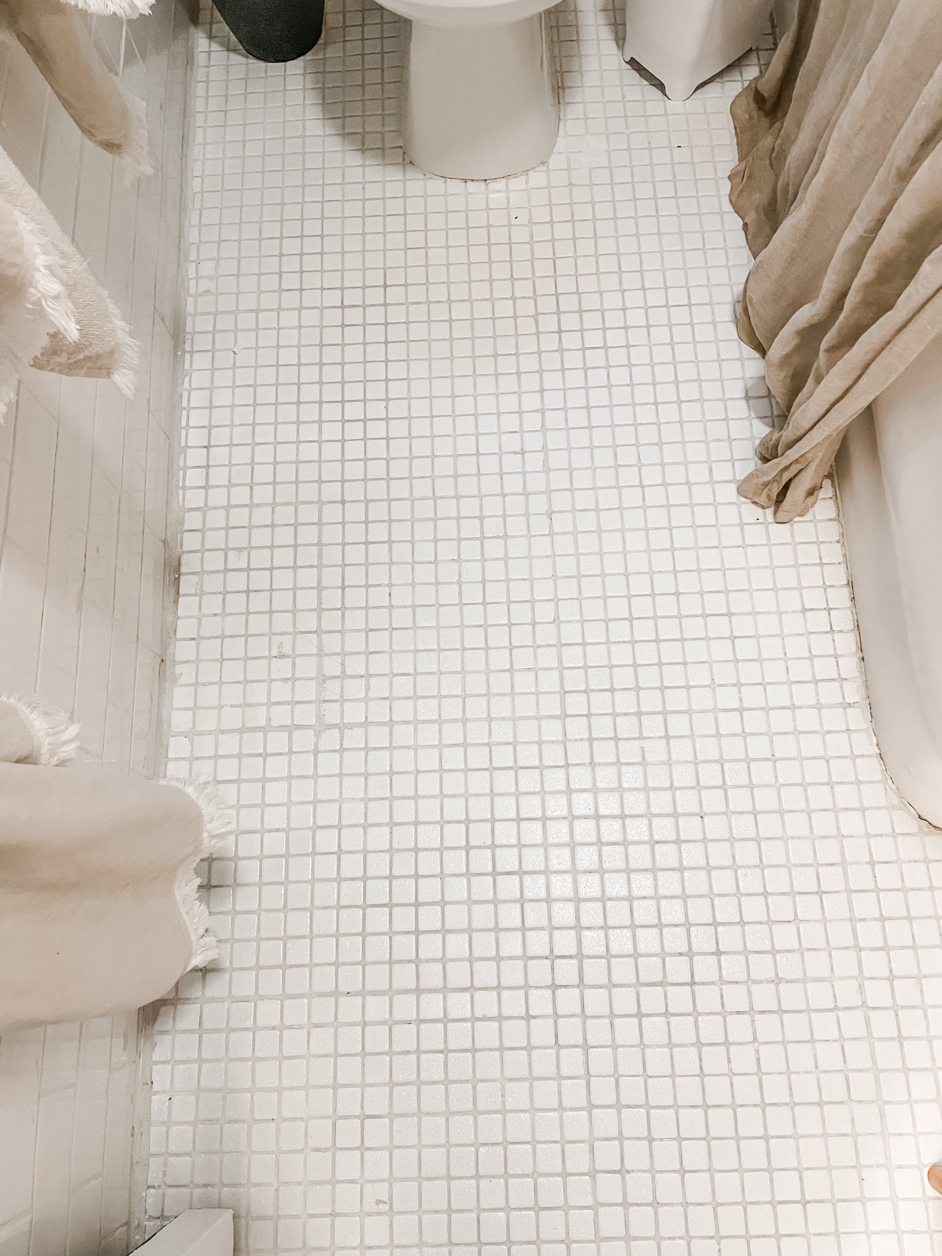 Peel and Stick Tiles Are the Solution to Your Dingy Rental Bathroom