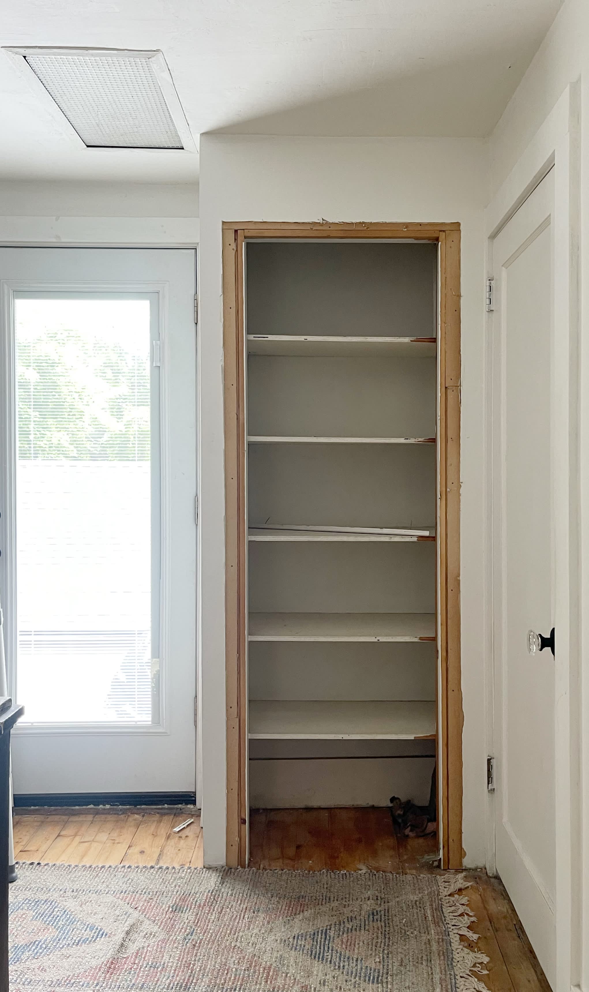 https://cdn.apartmenttherapy.info/image/upload/v1690341419/at/home-projects/2023-07/carli-diy-collective-closet-door/carli-closet-doors-casing-removed.jpg