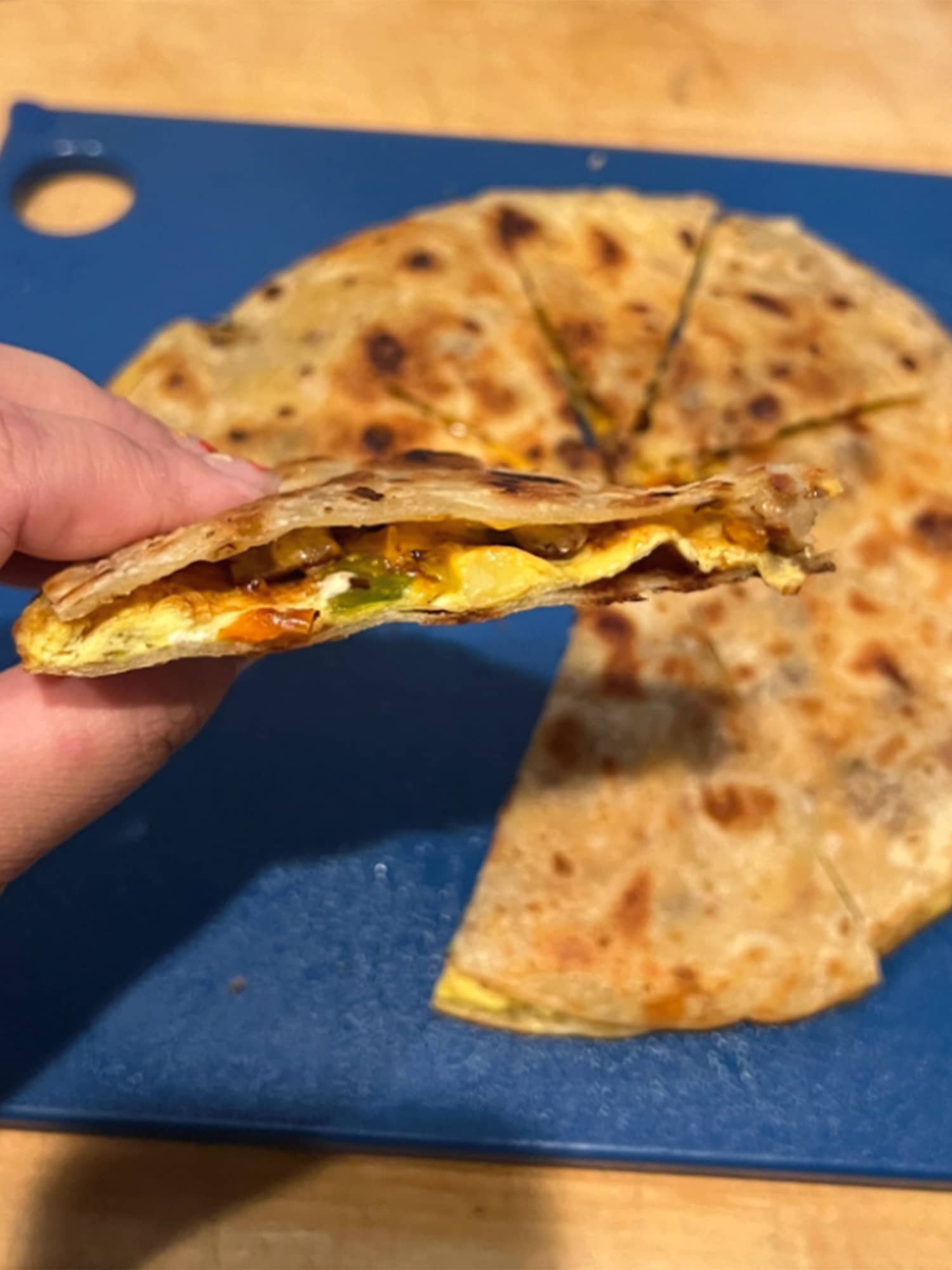 https://cdn.apartmenttherapy.info/image/upload/v1690388802/k/Edit/2023-07-breakfast-quesadilla/quesadilla-6.jpg