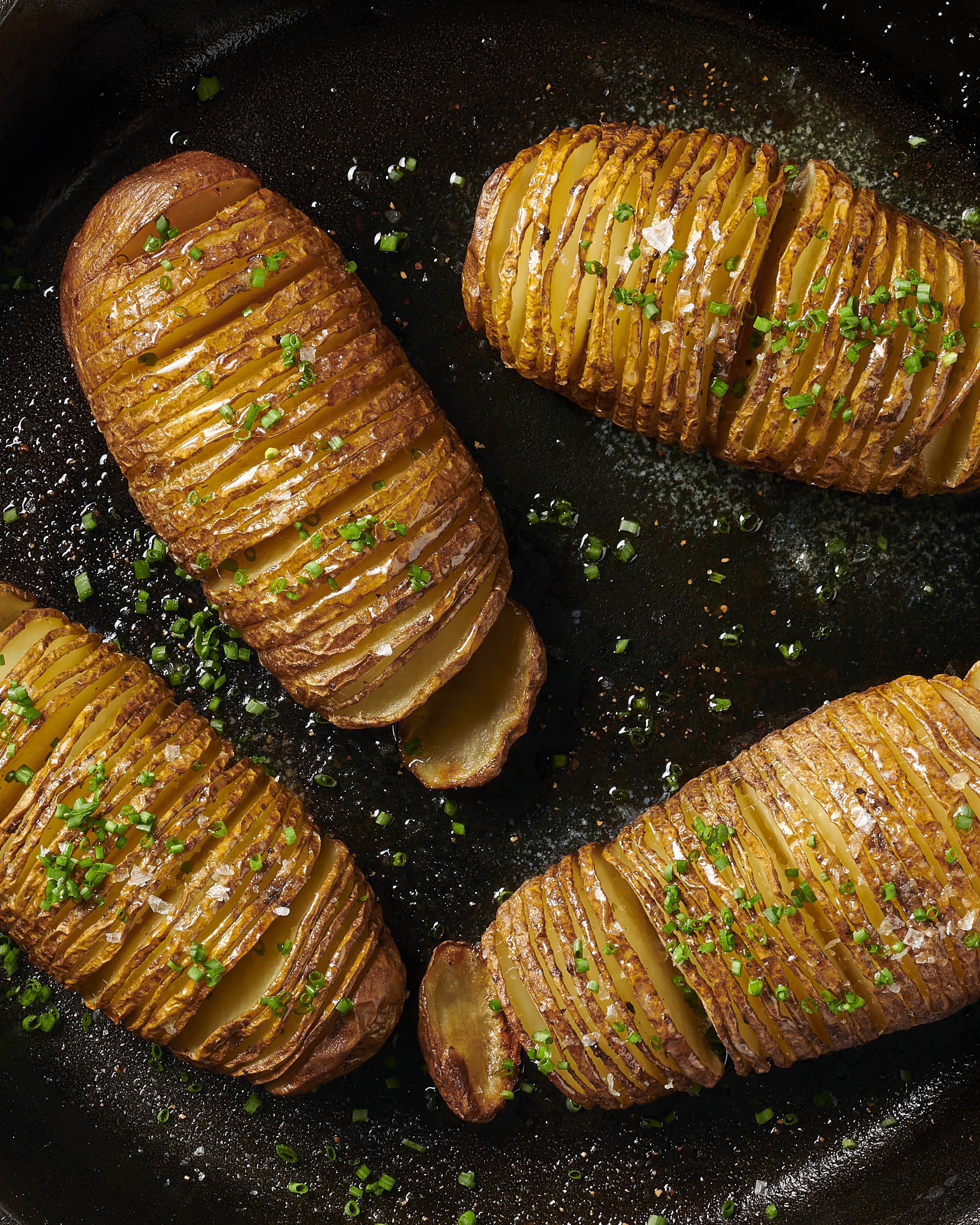 sliced baked potato with olive oil