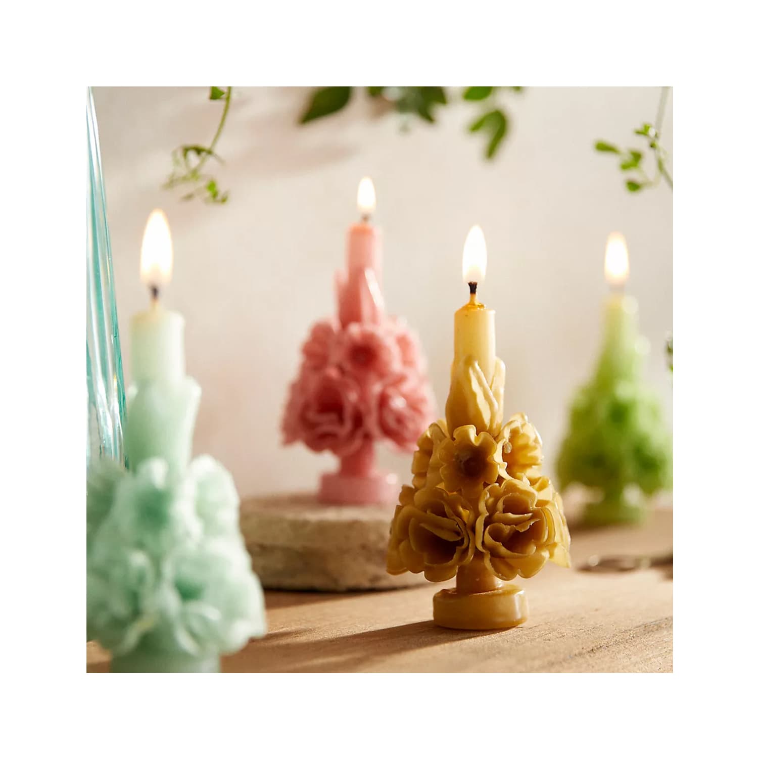 How to add a cheerful flower design to a taper candle