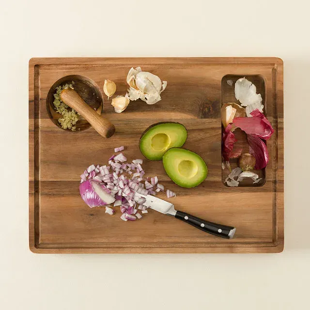 https://cdn.apartmenttherapy.info/image/upload/v1698081453/k/uncommon-goods-kitchen-wiz-cut-prep-board.webp