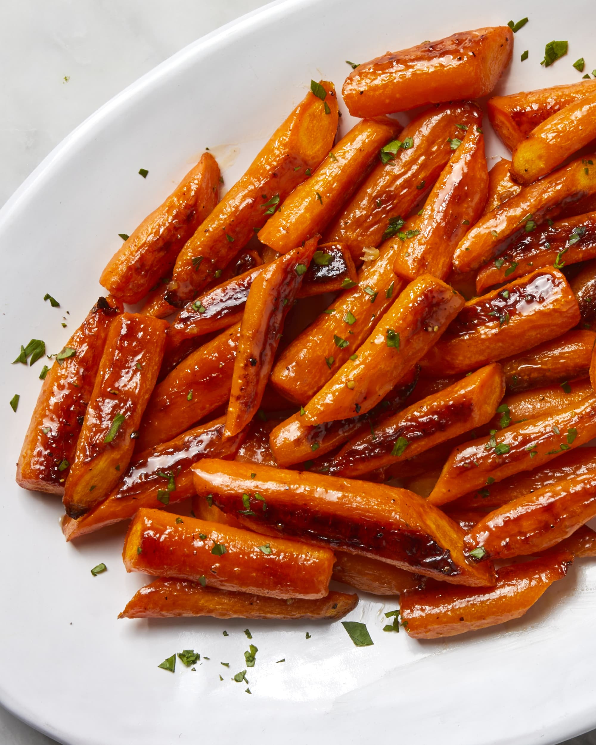 https://cdn.apartmenttherapy.info/image/upload/v1699467789/k/Photo/Recipes/2023-11-honey-glazed-carrots/33086-Honey-Glazed-Carrots.jpg?utm_source=chatgpt.com