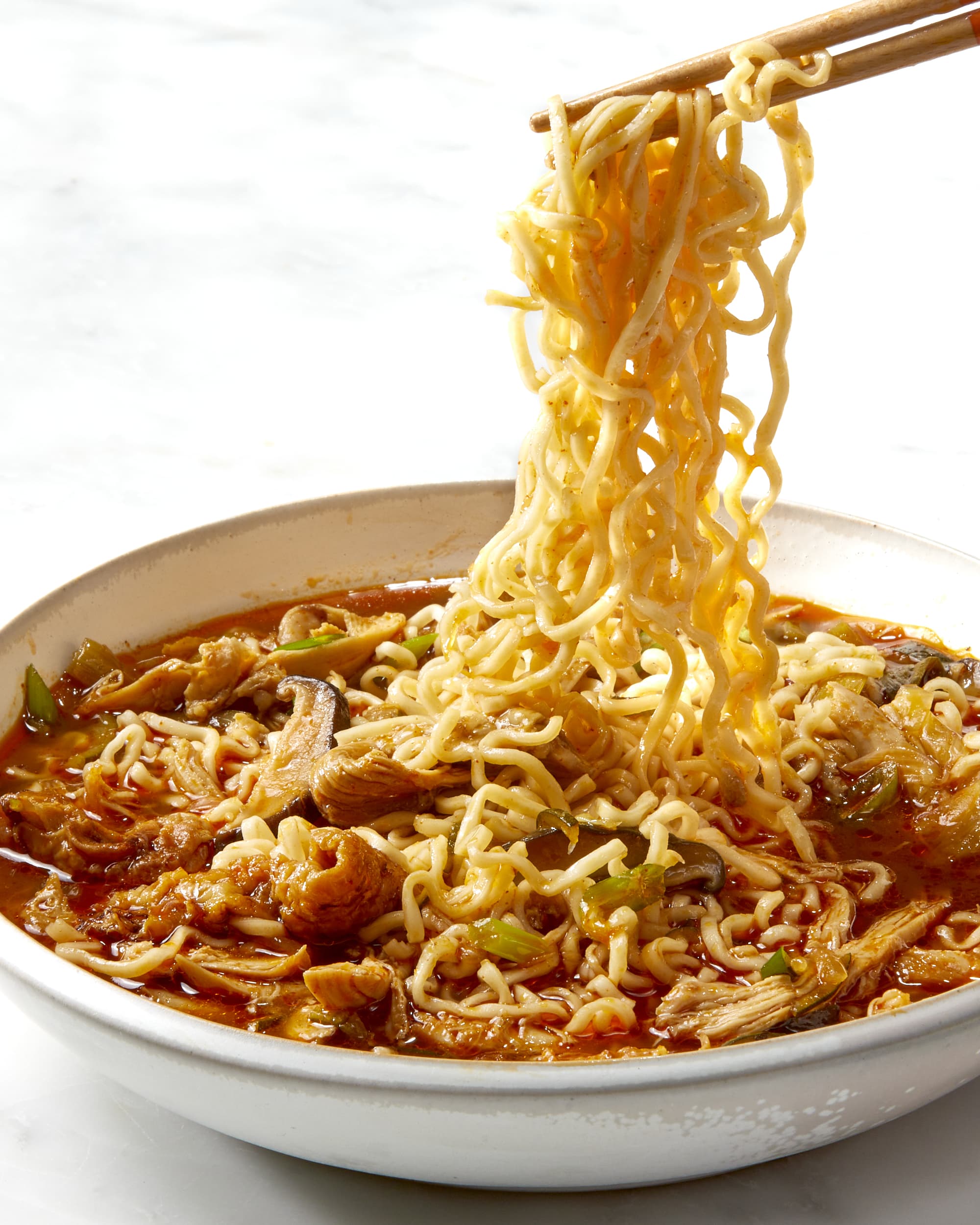 https://cdn.apartmenttherapy.info/image/upload/v1701724245/k/Photo/Recipes/2023-12-gochujang-chicken-noodle-soup/gochujang-chicken-noodle-soup-641.jpg