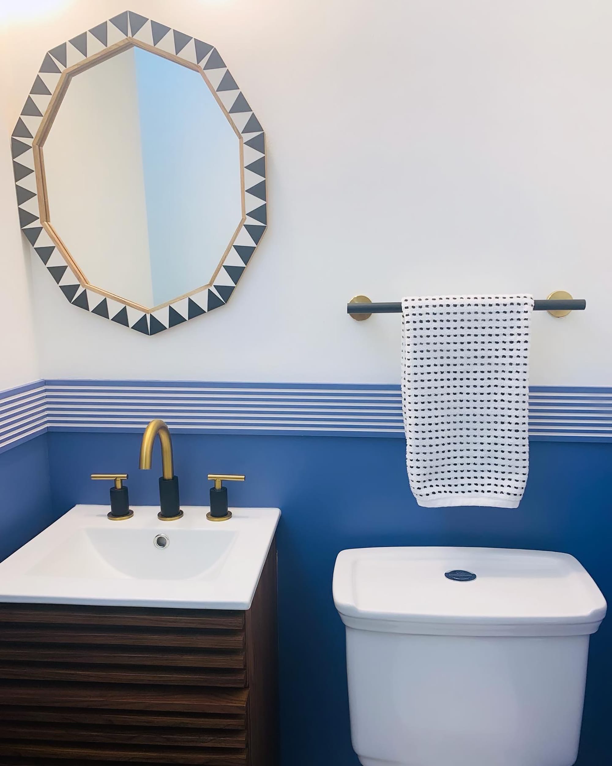 See a “Way Dated” Bath Become a Dreamy Blue Oasis for $2,100