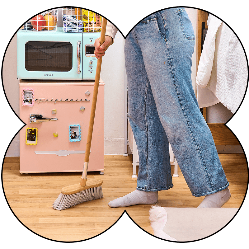 Person sweeping the floor