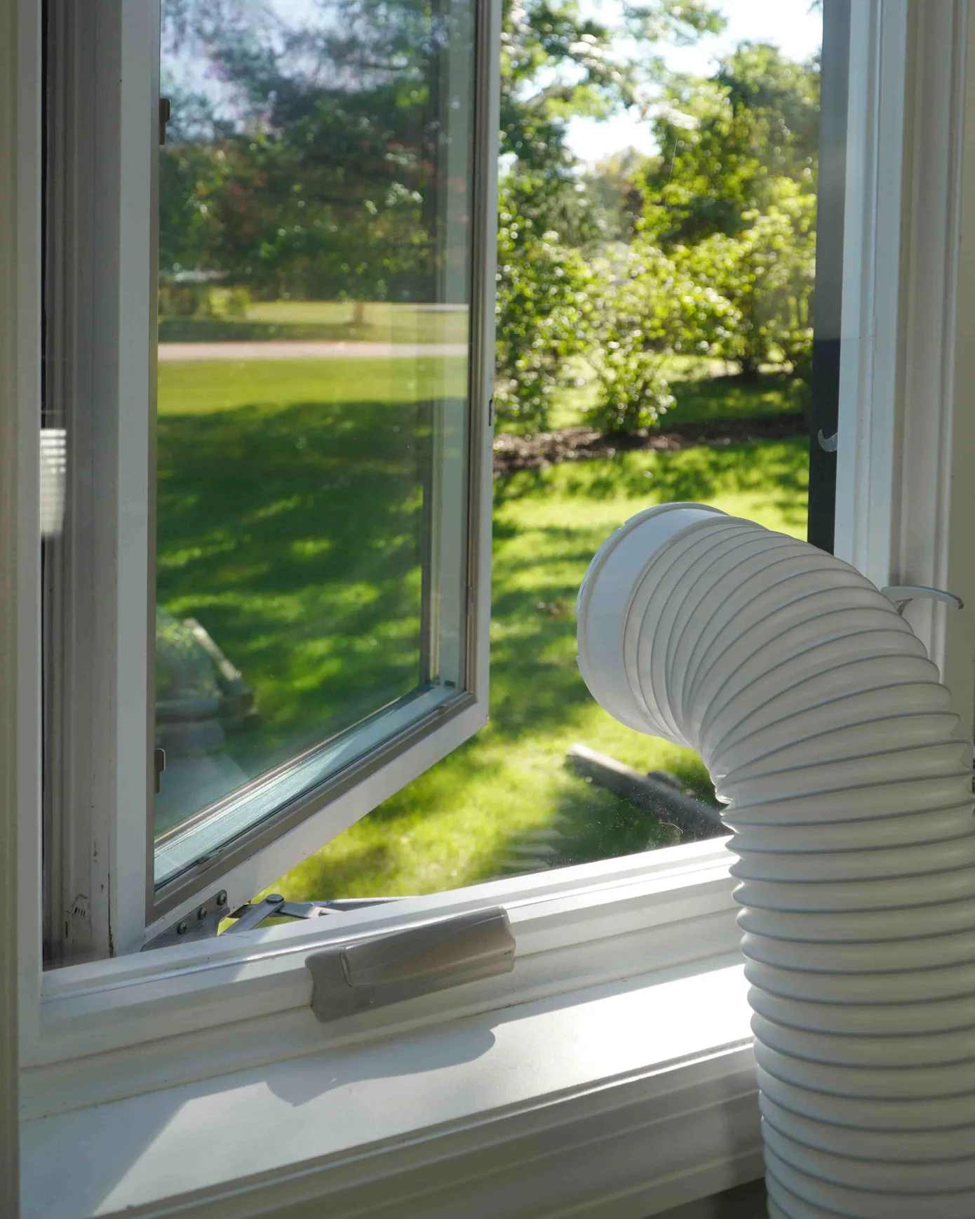 See a Renter's Chic Casement Window AC Setup Apartment Therapy