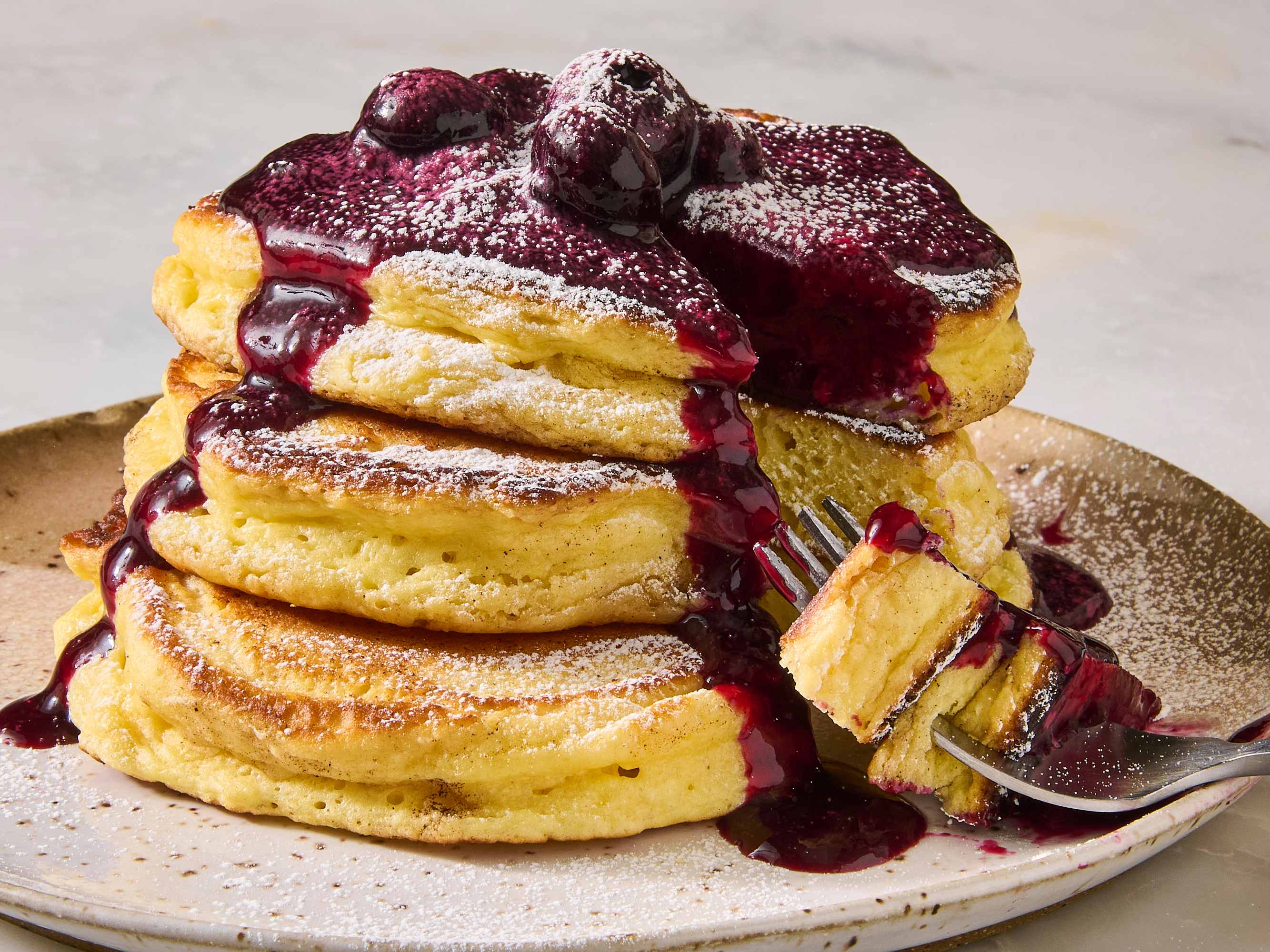 https://cdn.apartmenttherapy.info/image/upload/v1768933146/tk/photo/2026/01-2026/2026-01-lemon-ricotta-pancakes/lemon-ricotta-pancakes-247.jpg